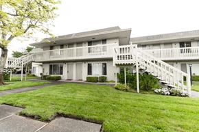 Novato apartment for rent - Exterior building with grass and stairs at OTAVON APARTMENTS, Novato