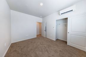 Reno apartment for rent - a room with carpet and white walls and a closet at Springview by Vintage, NV, 89512