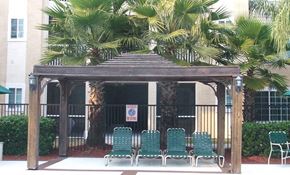Tampa apartment for rent - Lounge chairs by pool at Clipper Cove, Tampa, 33616