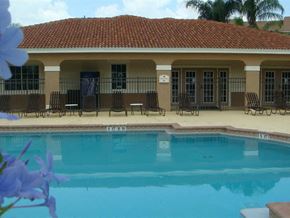 Fort Myers apartment for rent - Pool and lounge chairs at Hawk's Landing Apartments, Florida