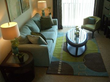 Fort Myers apartment for rent - a living room with a couch and a table