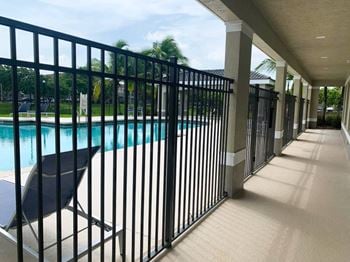 Swimming pool and lounge chairs 