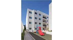 Los Angeles apartment for rent - a playground in front of a white building