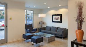 Los Angeles apartment for rent - a living room with couches chairs and a coffee table