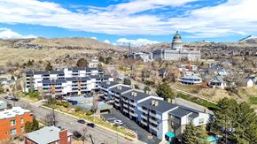 Salt Lake City apartment for rent - A view of a city with a large building in the background.