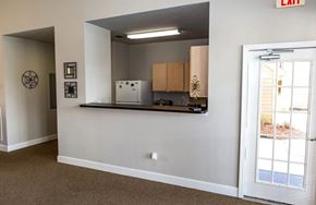 Crestview apartment for rent - A kitchen area with a white fridge at ADDISON PLACE, CRESTVIEW, FL 32536