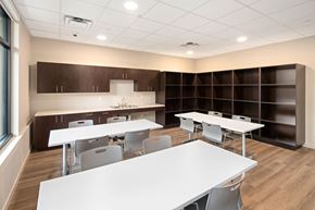 Portland apartment for rent - A room with tables and chairs and a kitchenette.at Traditions at Hazelwood, Portland