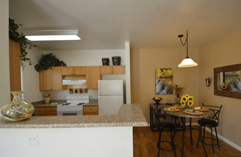 Kitchen appliances include range, dishwasher, refrigerator & disposal (north)