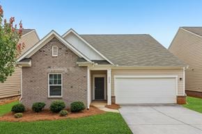 Locust Grove apartment for rent - A house with a grey roof and a white garage door.