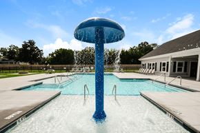 North Charleston apartment for rent - A blue water fountain in the middle of a pool.