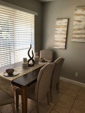 Houston apartment for rent - A dining room with a table and chairs.