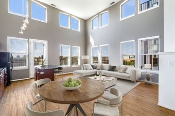 Minneapolis apartment for rent - a living room with a couch and a table