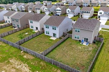 Summerville townhouse for rent - A row of houses with a fence in front of them.