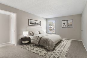 Mableton apartment for rent - Bedroom with large window and soft plush carpeting at Mableton Ridge Apartments in Mableton, GA, near Douglasville.