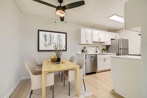 Aurora apartment for rent - Spacious pet-friendly apartment dining area with ceiling fan at Aurora Meadows near Green Valley Ranch