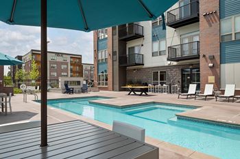 Helios terrace outdoor spa with e-shaped pool