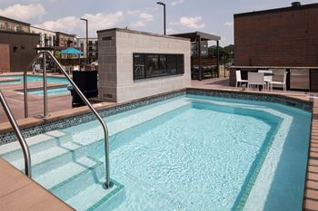 Helios terrace outdoor spa with e-shaped pool