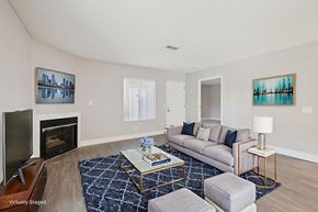Henderson apartment for rent - A living room with a fireplace and a couch.