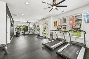 Hickory apartment for rent - A spacious Hawks Landing fitness center in Hickory NC featuring treadmills and modern exercise equipment