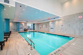 New Rochelle apartment for rent - a swimming pool in the lobby of a hotel