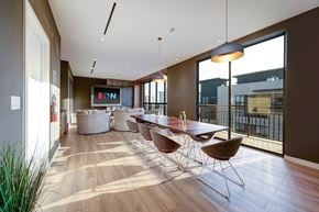 Fort Lauderdale apartment for rent - a dining room with a table and chairs and a large window