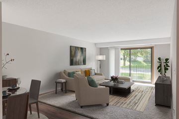 Golden Valley apartment for rent - a living room filled with furniture and a large window