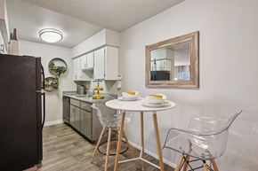 Mesa apartment for rent - A kitchen with a table and chairs.