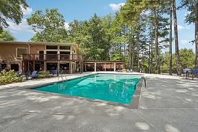 Marietta apartment for rent - A large swimming pool in front of a resort.