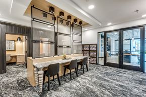 Austin apartment for rent - A modern dining area with a long table and chairs.