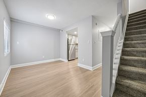 Raleigh apartment for rent - A room with a staircase on the right side.