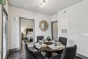 Odessa apartment for rent - Cozy dining space with elegant lighting and modern furnishings at Lotus at Starkey Ranch in Odessa, Florida.
