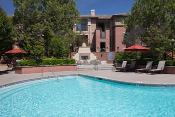 Resort style swimming pool, spa and cabanas