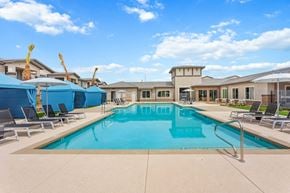 Glendale apartment for rent - our apartments have a swimming pool with chairs and umbrellas