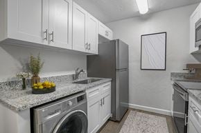 Gainesville apartment for rent - Addison Lane Apartment homes in Gainesville Florida photo of kitchen with stainless steel appliances