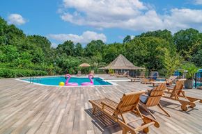 Stone Mountain apartment for rent - Affinitee at Stone Mountain Apartments photo of a swimming pool with deck chairs around it