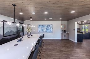 Moreno Valley apartment for rent - a long dining room with a long table and chairs