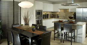 Irvine apartment for rent - A modern kitchen with a dining table and chairs.