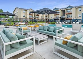 Vancouver apartment for rent - our apartments feature a pool and lounge area with furniture and tables