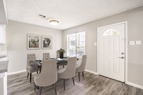 Las Vegas apartment for rent - A dining room with a table set for six.