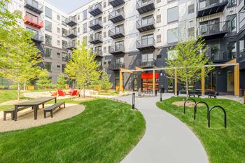 Courtyards and seating-areas in park-like settings and multiple grill stations.