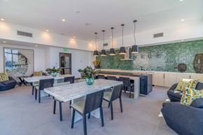 Oakland apartment for rent - a dining area with a table and chairs and a kitchen