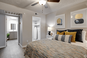 Phoenix apartment for rent - a bedroom with a bed and a ceiling fan