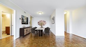 Washington apartment for rent - A dining room with a table set for four.