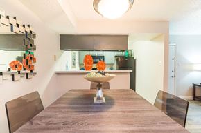 San Antonio apartment for rent - a dining room table with a kitchen in the background