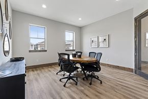 Lewisville apartment for rent - a dining room with a table and chairs and a window
