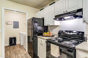 Atlanta apartment for rent - Kitchen with black appliances at Ashford at Spring Lake in Atlanta, Georgia