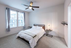 Atlanta apartment for rent - Station R Apartments in Atlanta GA photo of bedroom with large window and ceiling fan