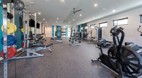 Phoenix apartment for rent - Fully Furnished Townhomes for Rent in North Phoenix, AZ - Bloom at Deer Valley - Fitness Center With Weight Machines, Dumbbell Racks, Cardio Equipment, and Ceiling Fans.