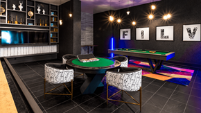 Las Vegas apartment for rent - A room with a pool table and chairs.