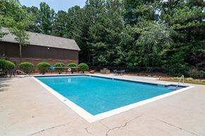 Duluth apartment for rent - Resort-style swimming pool with sundeck at Flats at Riverview in Duluth, GA